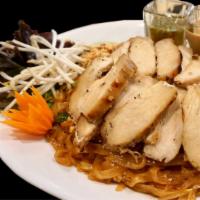 S-1 Pad Thai Lemongrass Chicken · Thin rice noodles,egg,bean sprout,onions,lime,ground peanut, topped with marinated grilled c...