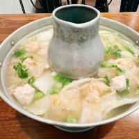 33. Shrimp Wonton Soup · Traditional Thai soup with shrimp wonton, ground chicken, green onion, cilantro and napa cab...