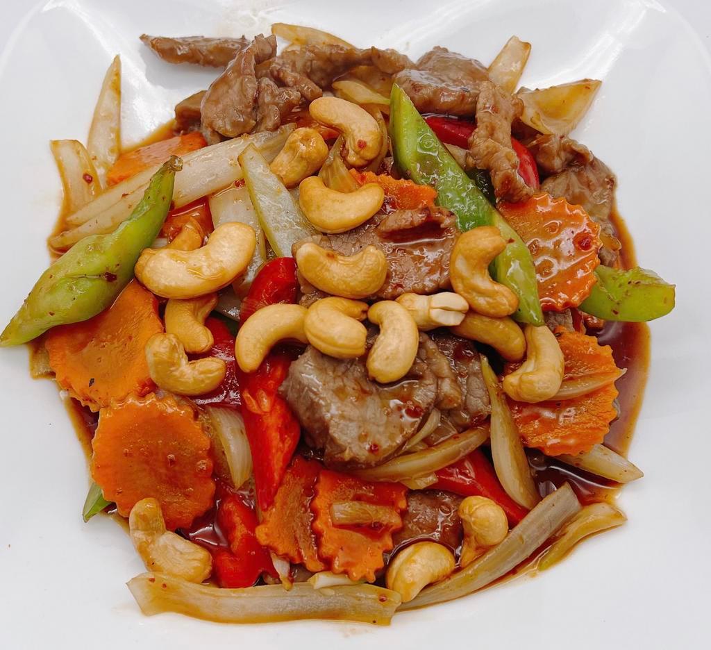 52. Pad Med Ma Muang (GF) · Cashew nuts, onions, carrot, green onion, cilantro and bell pepper.