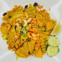 73. Pineapple Fried Rice (GF) · Fried rice with pineapple, onions, tomato, pea and carrot, egg, curry powder, raisin, cucumb...