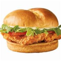Classic Crispy Chicken Sandwich · Lightly seasoned and breaded 100% all white meat chicken breast topped with lettuce, tomatoe...