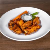 Chicken Wings · 1 lb. of bone-in wings tossed in your choice of mild, medium, hot, volcano, garlic Parmesan ...
