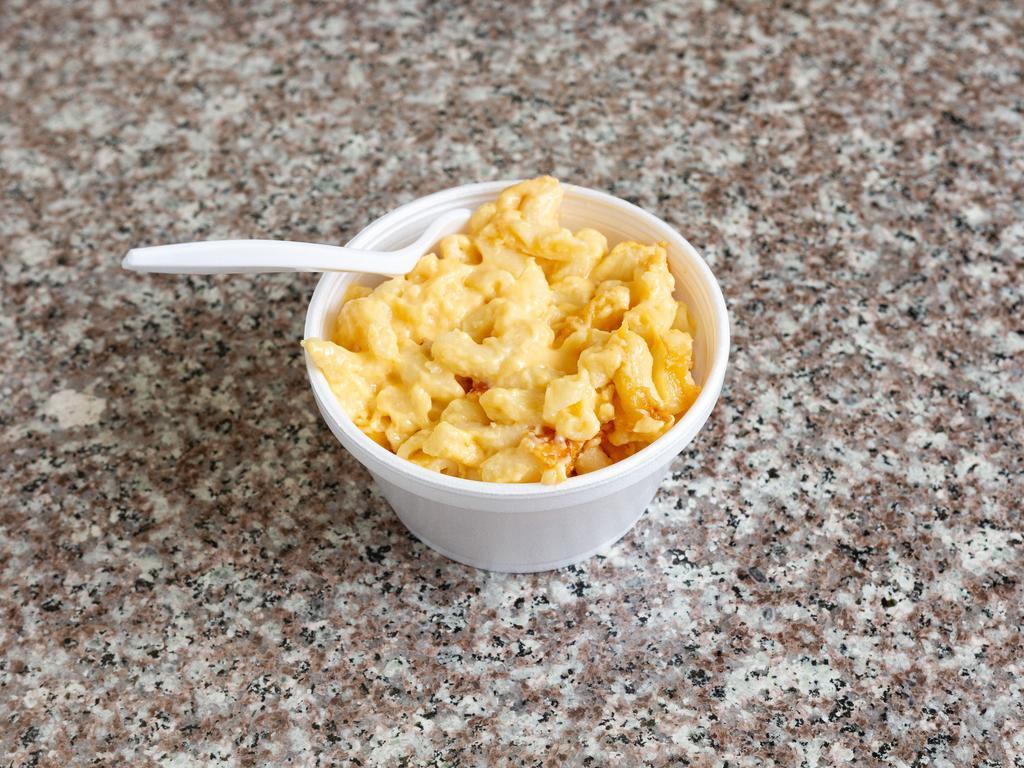 8 oz. Mac and Cheese · Macaroni pasta in a cheese sauce.