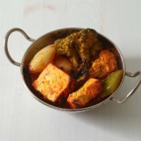 Tandoori Mix Vegetables · Seasoned mixed vegetables marinated in sour cream with mild spices.