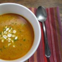 Mulligatawny Soup(chicken) · Ground yellow lentils, slices of chicken, and pepper powder, garnished with rice.