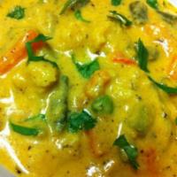 Navrathan Korma · Vegetables cooked in creamy mild sauce with cashew nuts. Served with rice.