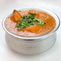 Paneer Tikka Masala · Homemade cottage cheese cooked in creamy tomato sauce. Served with rice.