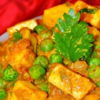 Mutter Paneer · Green peas and paneer with creamy curry sauce. Served with rice.