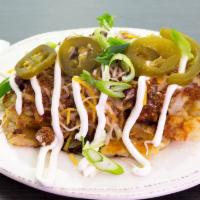 Side Billyfy Papas · CHILI, JALAPEÑOS, MONTEREY JACK AND CHEDDAR CHEESE, SCALLIONS, AND SOUR CREAM