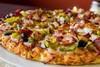 Pastrami Slice Pizza · Our traditional sauce with a mustard kick topped with mozzarella cheese, the finest pastrami...