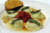 Florentine Ravioli · Pasta pillows filled with spinach and ricotta with browned butter and sage sauce.