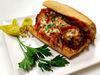 Meatball Sandwich · Sauteed onions, red and green bell peppers in red wine with marinara sauce and jumbo meatballs topped with mozzarella cheese.