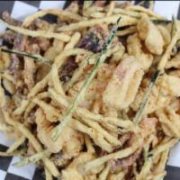 Fritto Misto · Crispy fried calamari, bay scallops, shrimp, zucchini, herbs, lemon and marinara.