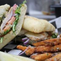 Chicken Sandwich Lunch · Grilled chicken breast, arugula, tomatoes, onions, and provolone cheese and pesto aioli, on ...