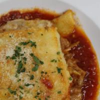 Lasagna Bolognesse  · Meat & tomato ragu, bechamel, ricotta, mozzarella, parmesan & marinara sauce.