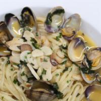 Linguini Vongole · Manila clams, garlic white wine basil lemon zest sauce.