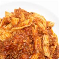 Garganelli Bolognese · Traditional meat sauce and fresh ricotta.