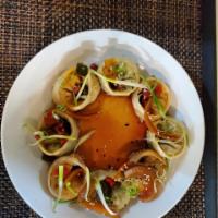 JjinMandu  · Korean vegetable dumplings with fresh scallion, garlic soy vinaigrette and black sesame seed...