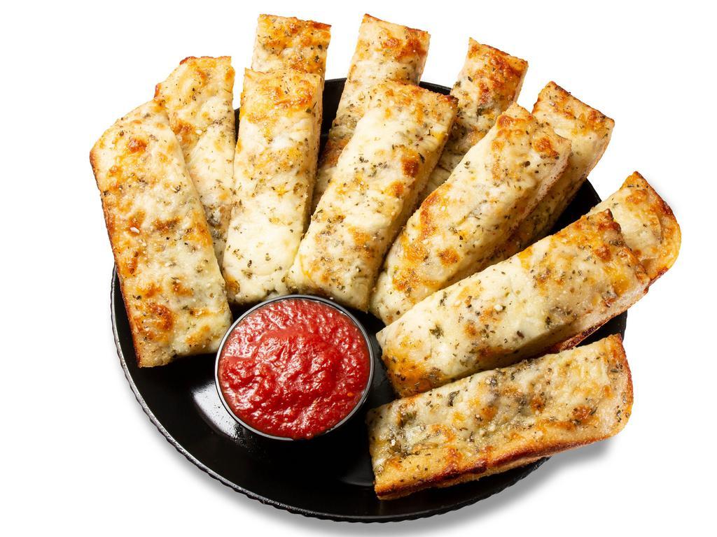 Cheesy Breadsticks · Oven baked Garlic Buttered Breadsticks topped with seasonings, Parmesan, Romano, and Mozzarella cheese.  Dip or Dunk, served with a large pizza sauce. 