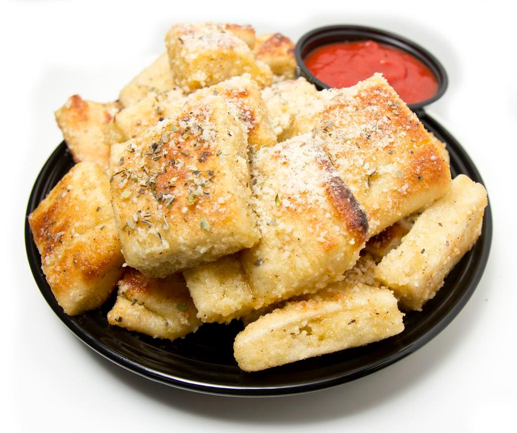 Garlic Parmesan Yummy Bread Bites · Oven baked bread bites tossed in garlic butter sauce, seasonings, and Parmesan cheese. Served with pizza sauce for dipping.