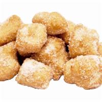 Original Fried Yummy Dough · Our fresh daily made dough lightly fried then tossed in our blend of cinnamon and sugar.