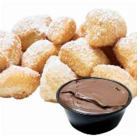Nutella Fried Yummy Dough · Our Original Fried Dough + topped with powdered sugar + served with NUTELLA side for dipping.