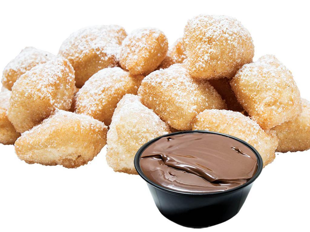 Nutella Fried Yummy Dough · Our original fried dough, topped with powdered sugar, and served with nutella side for dipping.