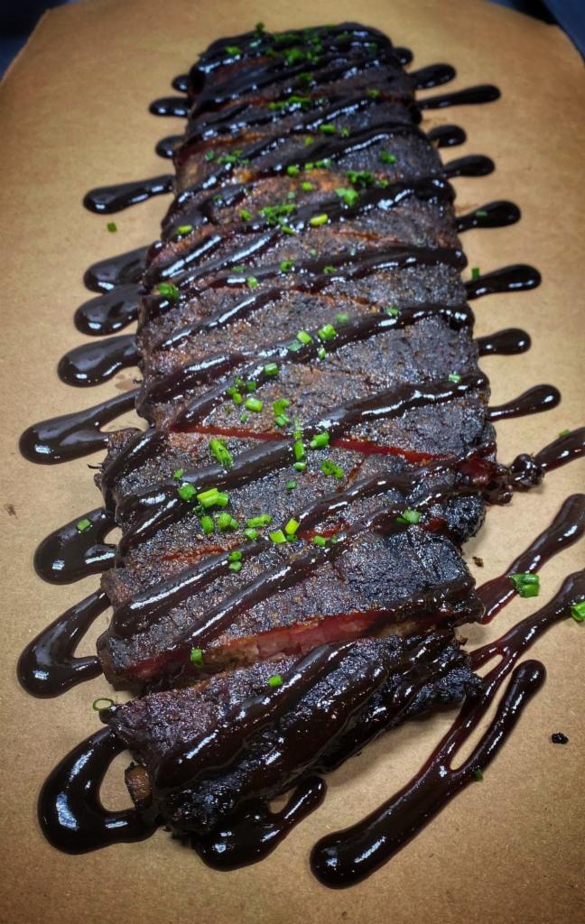 Pork Ribs · Spare rib, dry-rubbed, lightly sauced with pickles.