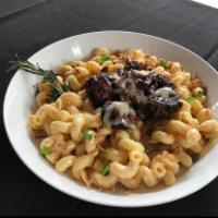 Mac & Cheese With Burnt Ends · A double order of our signature mac & cheese topped with 1/4 lb of burnt ends!