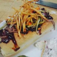 Brisket Dog  · Smoked Gastros kielbasa with shredded Brisket topped with red onion, julienne house pickles ...