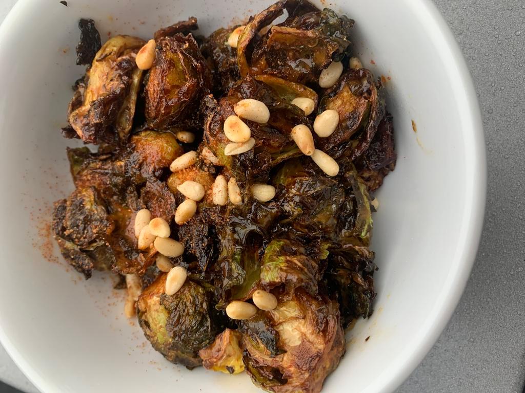Fried Brussel Sprouts  · Tangy sauce with pine nuts. 