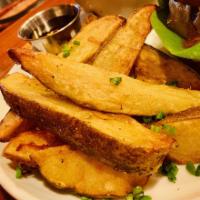 Jojo Potato Wedges  · Thick cut and perfectly season fried potato wedges. Not your average French fries