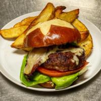 Great Northern Burger · 6oz beef patty, Bacon, choice of Cheese, Lettuce, Tomato on a Pretzel Bun