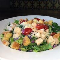 Kale Caesar Salad · Healthy baby kale & hearts of romaine. Topped with fresh Parmesan, croutons and tomato.
