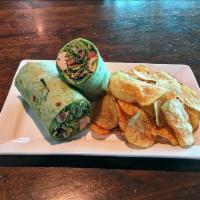 Southwest Wrap · Chilled, roasted chicken, mixed greens, avocado, corn and black bean relish, chipotle ranch ...