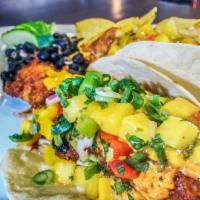 Ale Battered Fish Tacos · Ole ‘59er Amber Ale™ battered whitefish with mango salsa, shredded cabbage and spicy remoula...