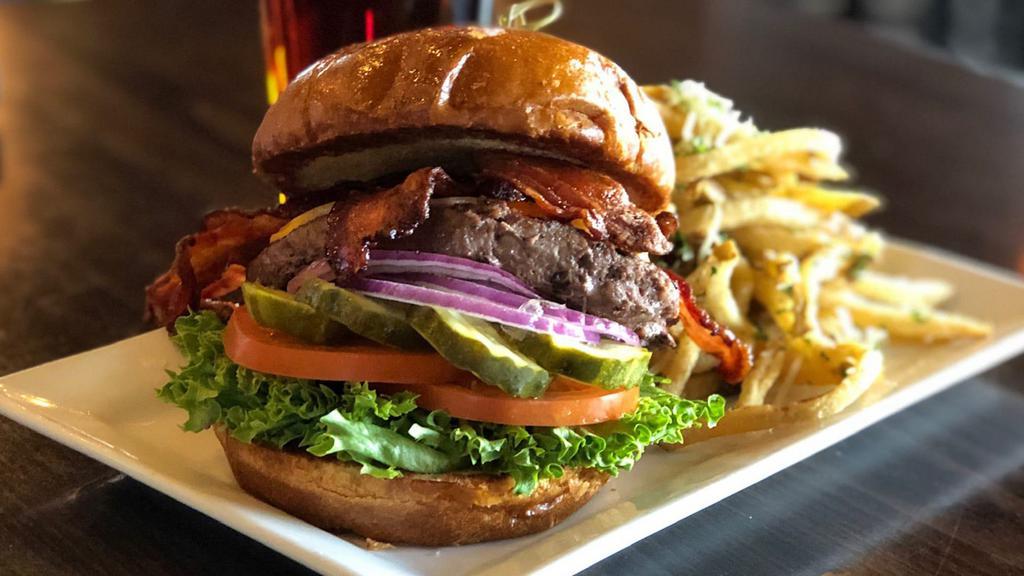 Build Your Own Burger · All natural beef patty, lettuce, tomato, onion and pickle on a brioche bun. Make it your own by adding toppings and cheese. Toppings are an additional charge.