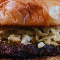 Mt. Bierstadt Burger · Blue cheese, crispy onion straws and our signature bourbon glaze on a brioche bun.