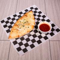 Create Your Own Calzone · Choose up to 4 toppings of your choice. We'll add the mozzarella.