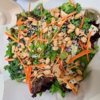 Veganese Salad · Mixed greens and kale tossed with apple, celery, house made thai peanut dressing. Topped wit...