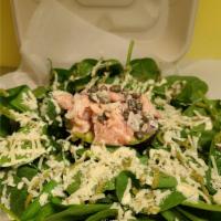 Smoked Salmon Tartare Salad  · Smoked salmon with capers, red onions, mixed with Caesar dressing. Served over a halved avoc...