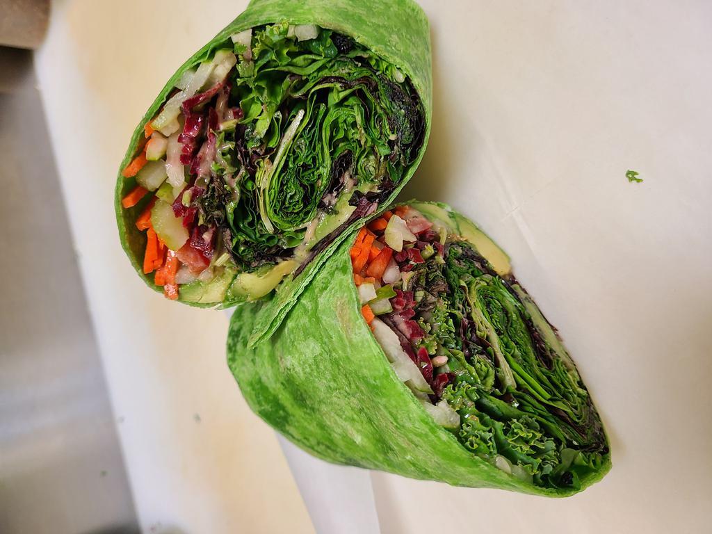 Da Veg Wrap  · Avocado, Bell Pepper, Beet, Celery, Carrot, Cucumber, Mint, Cilantro, mixed greens and local kale dressed with house made dressing wrapped in locally made spinach tortilla. 