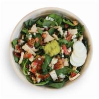 Chicken and Bacon Cobb Salad · Lively greens, chicken, gorgonzola, egg, tomatoes, bacon, mashed avocado, ranch dressing