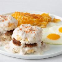 Biscuits and Gravy with Eggs · House-made sausage patties inside 2 buttermilk biscuits, topped with savory country sausage ...