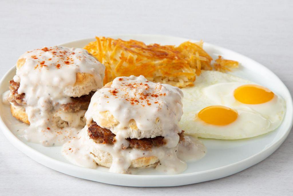 Biscuits & Gravy with Eggs · House-made sausage patties inside two buttermilk biscuits, topped with savory country sausage gravy. Pancakes not included.