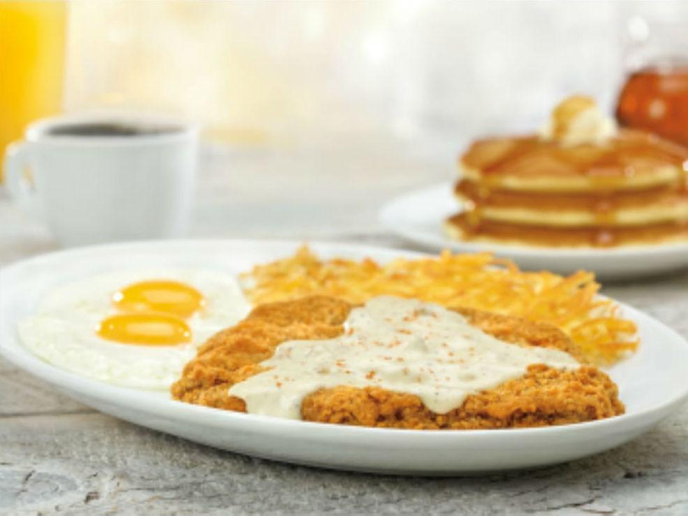 1/2 lb. Chicken Fried Steak and Eggs · Smothered in savory country sausage gravy. Served with 2 eggs any style, 3 made‑from‑scratch buttermilk pancakes and hash browns. Egg whites or low-cholesterol egg substitute available.