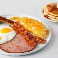 Ultimate Breakfast · 2 cherrywood-smoked bacon strips, 2 sausage links and grilled ham steak. Served with 2 eggs ...