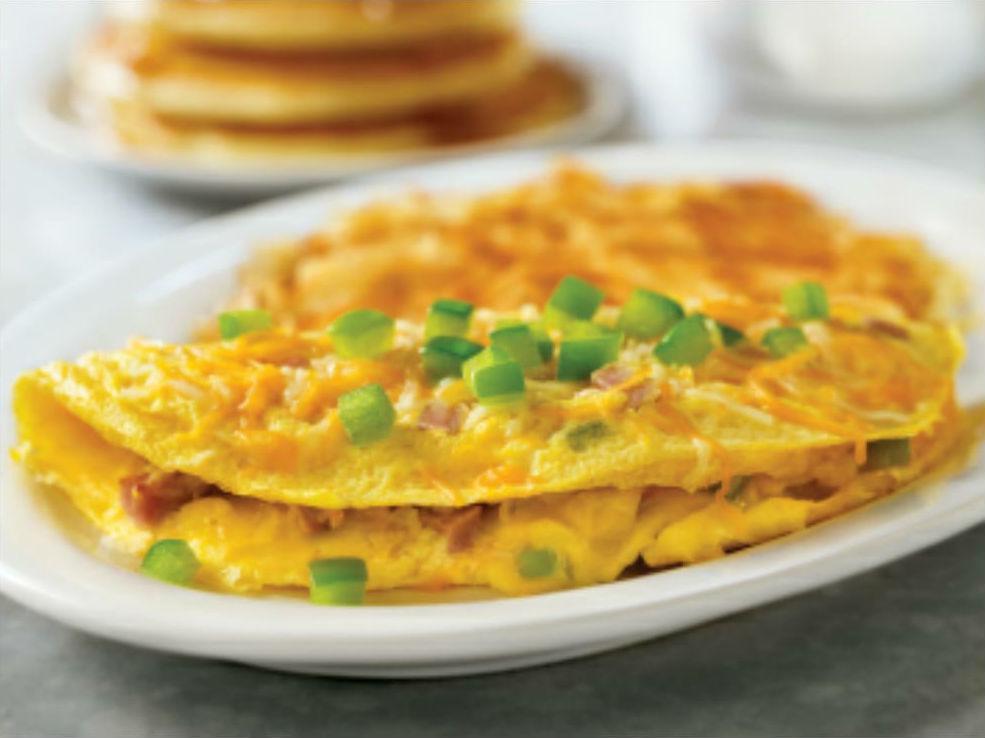 Denver Omelette · Diced ham, fresh green peppers and onions, topped with melted cheese.