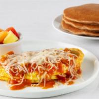 Garden Veggie Omelette · Onions, green peppers, tomatoes, and mushrooms. Topped with Spanish sauce and mozzarella che...