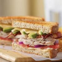 Turkey Bacon Avocado Melt · Hand-carved turkey breast with cherrywood-smoked bacon, avocado, pepper jack cheese, red oni...